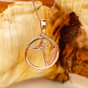 Circular Rose Gold Bird of Prey Strelitzia Pendant