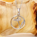 Circular White Bird of Prey Strelitzia Pendant