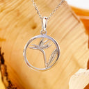 Circular White Bird of Prey Strelitzia Pendant