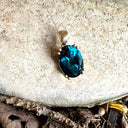 Classic Oval Cut Double Claw London Blue Topaz Yellow Gold Pendant