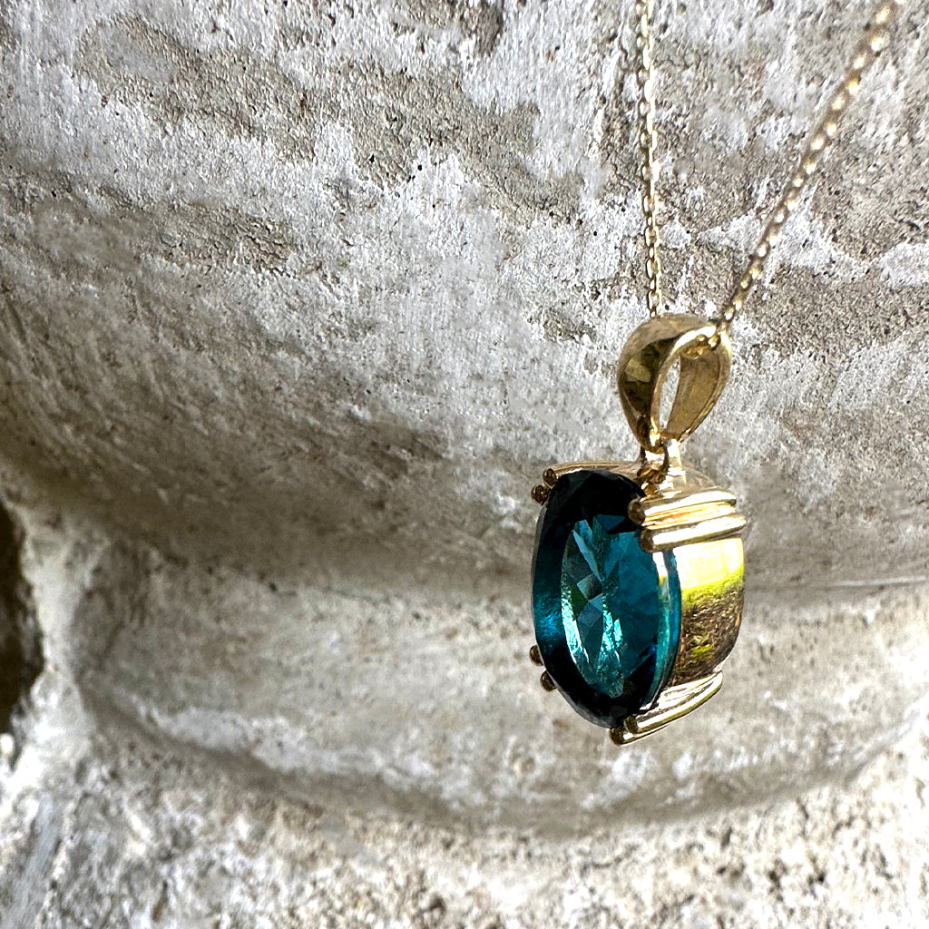 Classic Oval Cut Double Claw London Blue Topaz Yellow Gold Pendant