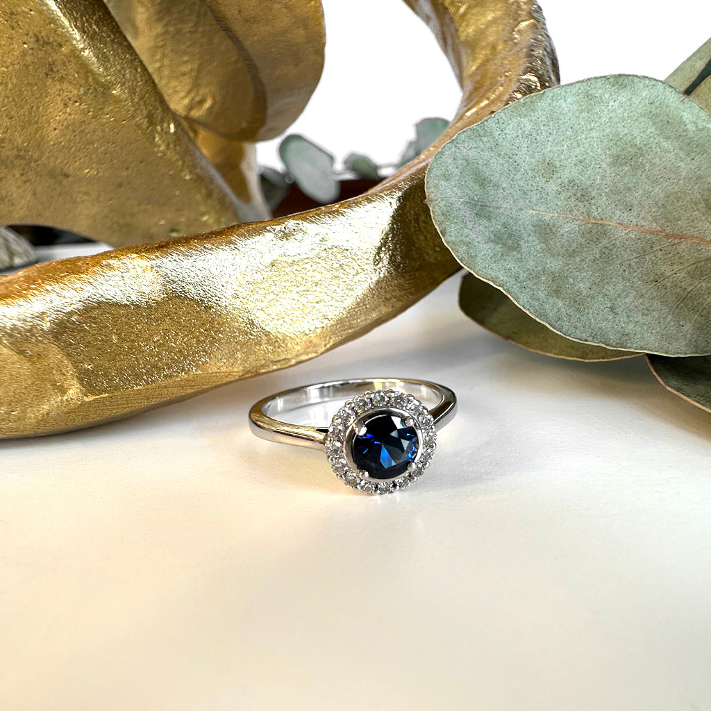 Classic Round Sapphire and Diamond Halo White Gold Ring