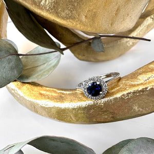 Classic Round Sapphire and Diamond Halo White Gold Ring