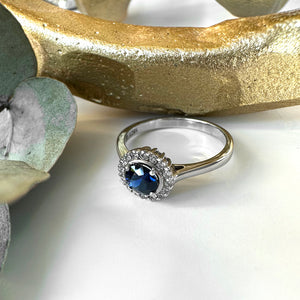 Classic Round Sapphire and Diamond Halo White Gold Ring