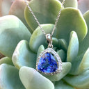 Classically Elegant Trilliant Tanzanite with Diamond Halo Pendant