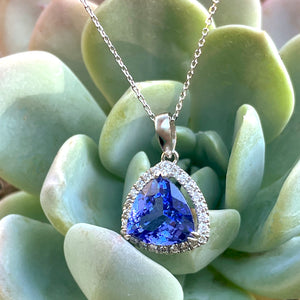 Classically Elegant Trilliant Tanzanite with Diamond Halo Pendant