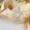 Contemporary Circular Giraffe Diamond and White Gold Pendant