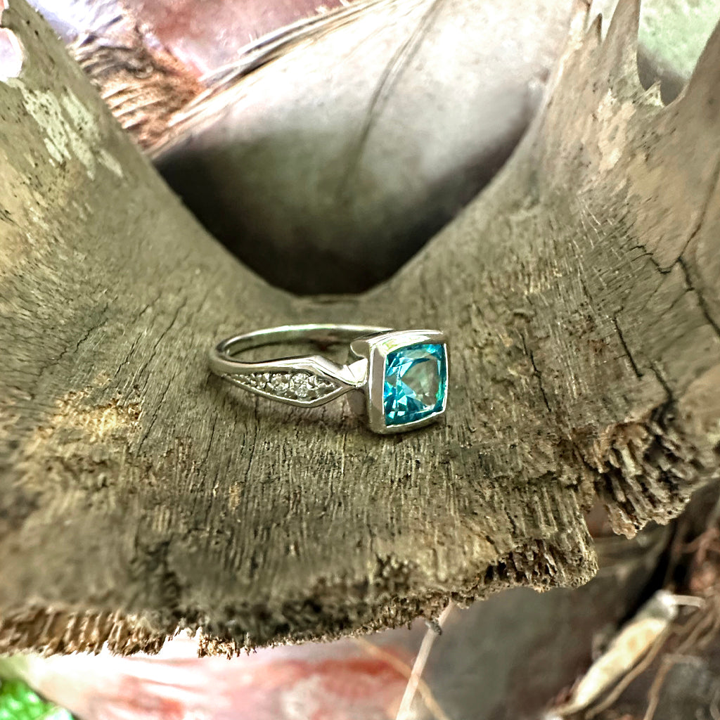 Contemporary Square Cushion Cut Blue Topaz With Diamond Shoulder Detail Ring
