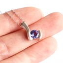 Contemporary Tanzanite White Gold Swish Pendant