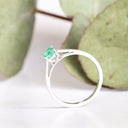 Cutie Pie Solitaire Emerald Four Claw White Gold Ring
