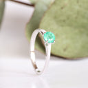 Cutie Pie Solitaire Emerald Four Claw White Gold Ring