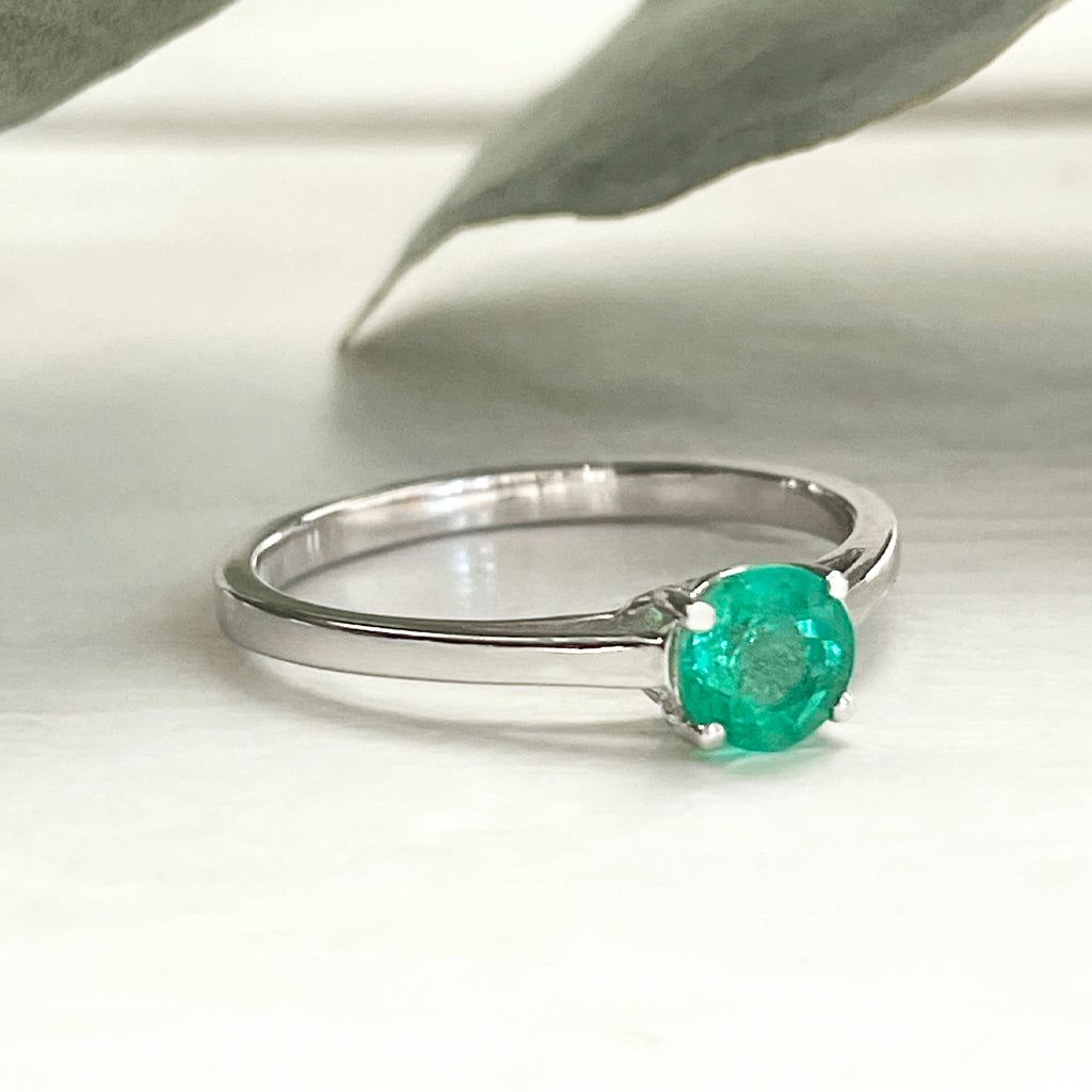 Cutie Pie Solitaire Emerald Four Claw White Gold Ring