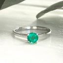 Cutie Pie Solitaire Emerald Four Claw White Gold Ring