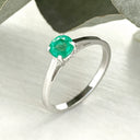 Cutie Pie Solitaire Emerald Four Claw White Gold Ring