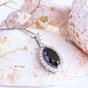 Decadent Marquise Cut Black Diamond With White Diamond Halo White Gold Pendant