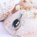 Decadent Marquise Cut Black Diamond With White Diamond Halo White Gold Pendant