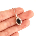 Decadent Marquise Cut Black Diamond With White Diamond Halo White Gold Pendant