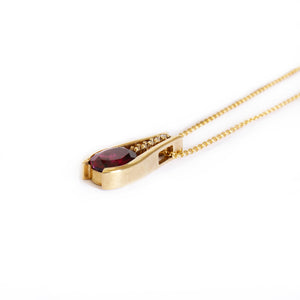 Deep Pink / Purple Oval Rhodolite and Diamond Drop Pendant
