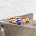 Tanzanite and diamond rose gold rin
