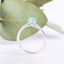 Delicate Solitaire Emerald Four Claw White Gold Ring