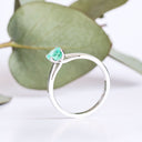 Delicate Solitaire Emerald Four Claw White Gold Ring