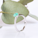 Delicate Solitaire Emerald Four Claw White Gold Ring