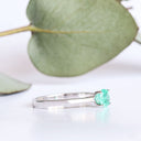 Delicate Solitaire Emerald Four Claw White Gold Ring