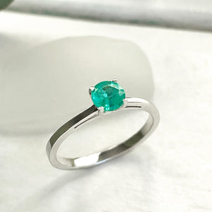 Delicate Solitaire Emerald Four Claw White Gold Ring
