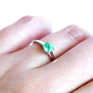 Delicate Solitaire Emerald Four Claw White Gold Ring