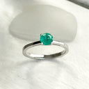 Delicate Solitaire Emerald Four Claw White Gold Ring