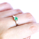 Elevated Caressing Gallery Emerald White Gold Ring
