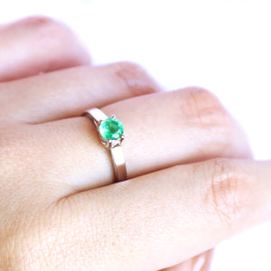 Elevated Caressing Gallery Emerald White Gold Ring