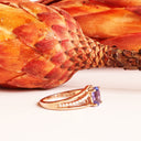Delicate Triple Diamond And Rose Gold Band Oval Cut Tanzanite Ring