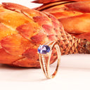 Delicate Triple Diamond And Rose Gold Band Oval Cut Tanzanite Ring