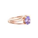 Delicate Triple Diamond And Rose Gold Band Oval Cut Tanzanite Ring
