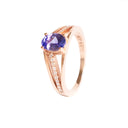 Delicate Triple Diamond And Rose Gold Band Oval Cut Tanzanite Ring