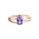 Delicate Triple Diamond And Rose Gold Band Oval Cut Tanzanite Ring