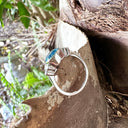 Delicately Bezel Set Blue Topaz with Trilogy Shoulder Diamond Highlight White Gold Ring