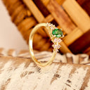 Delicately Cascading Diamond Band Tsavorite Yellow Gold Ring
