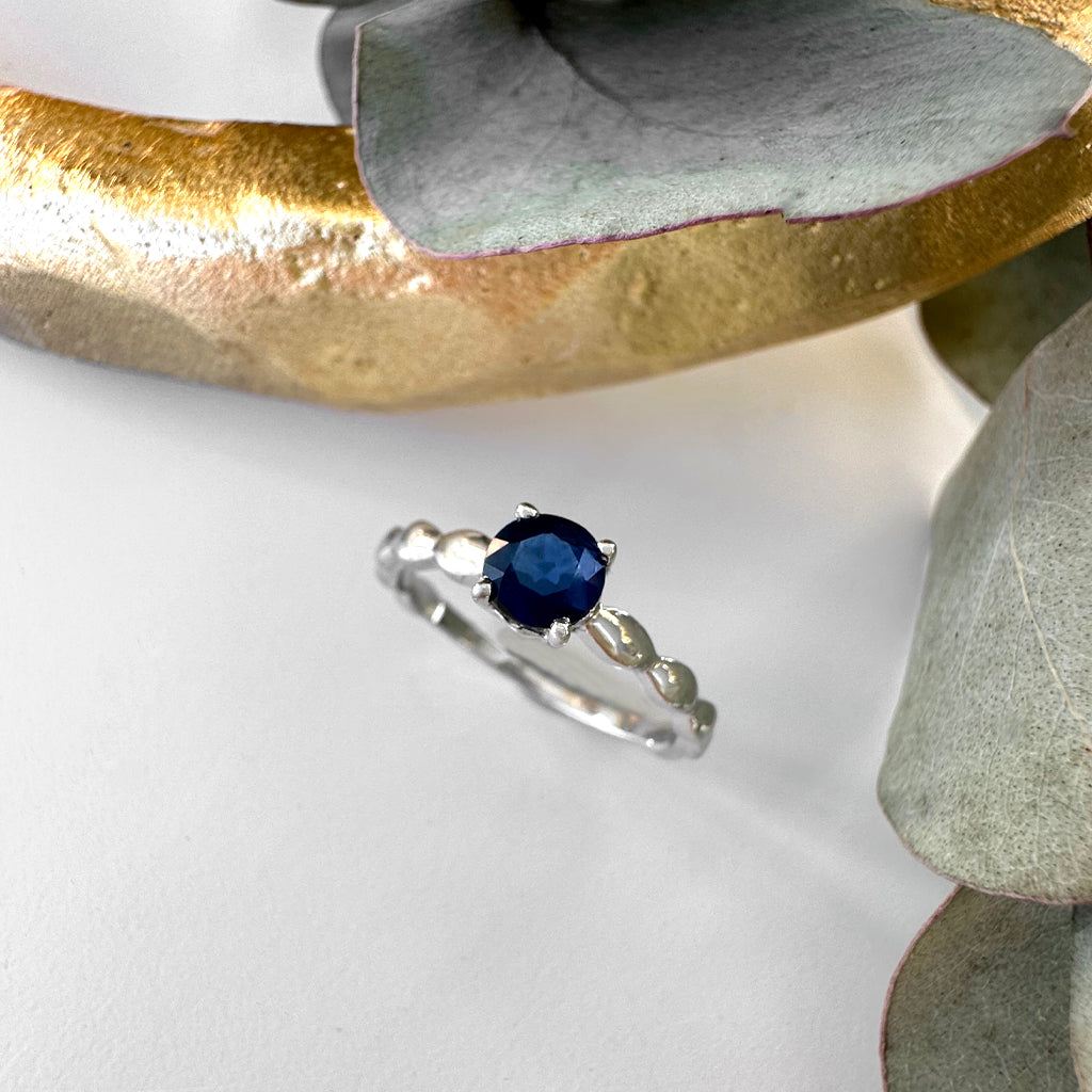 Delicately Crimped Band Sapphire White Gold Ring