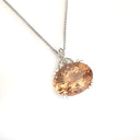 Elegantly Regal Peach Oval Morganite and Decorative Diamond Bale Pendant