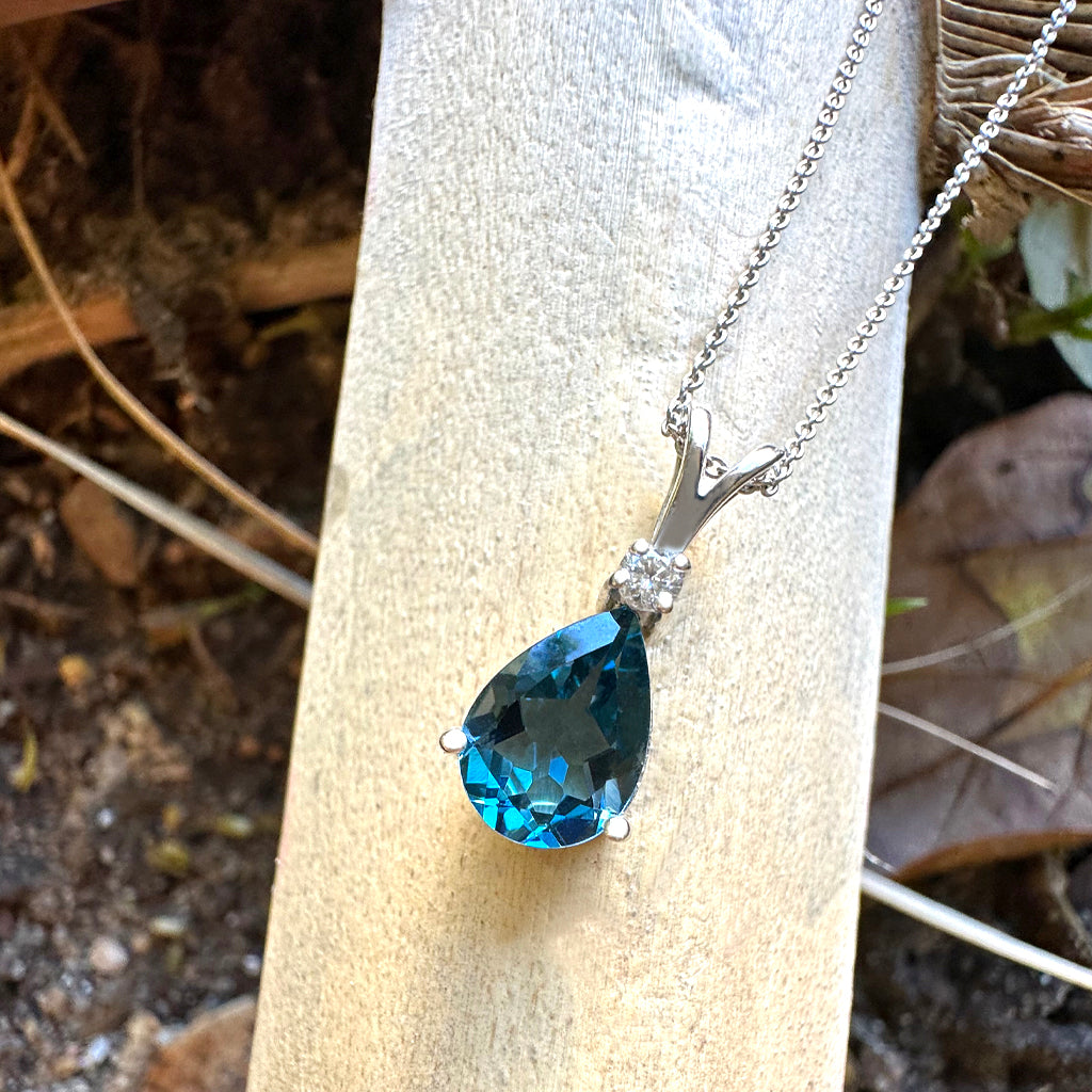 Delightful Handcrafted Split Bale Pear Drop Blue Topaz Pendant with Diamond Highlight