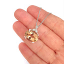 Elegantly Regal Peach Oval Morganite and Decorative Diamond Bale Pendant