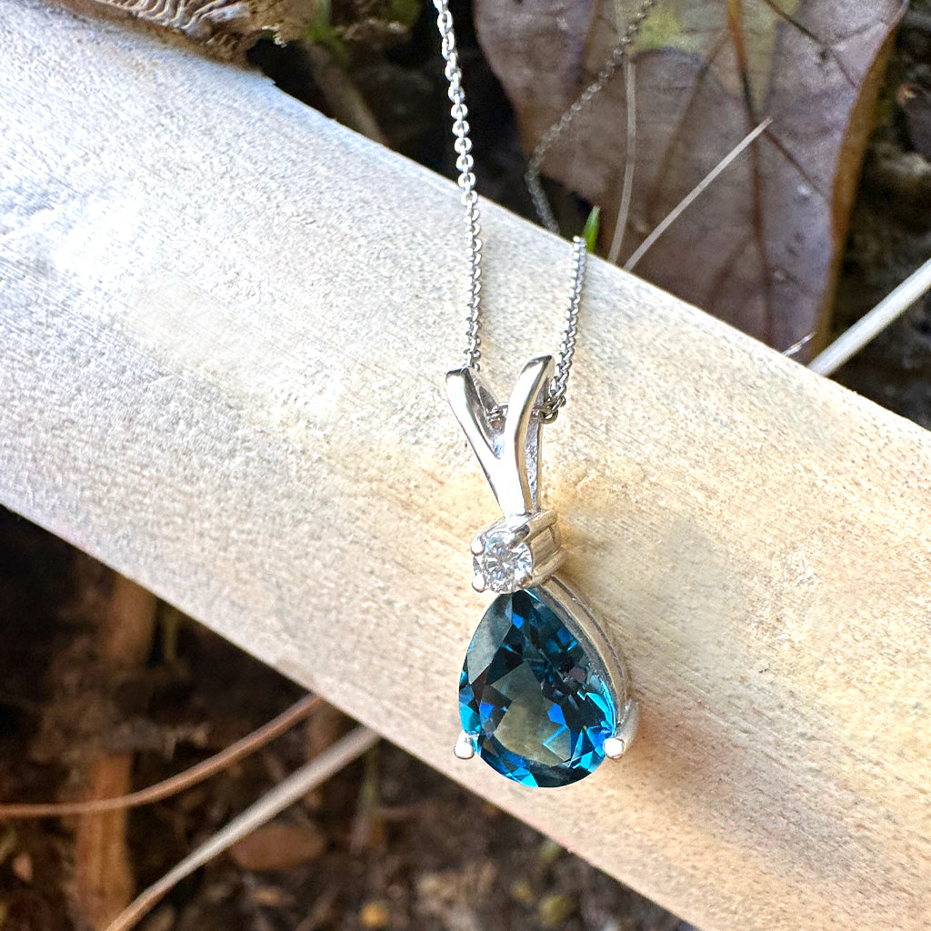 Delightful Handcrafted Split Bale Pear Drop Blue Topaz Pendant with Diamond Highlight