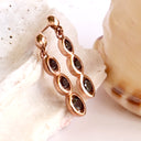 Delightfully Playful Black Diamond Rose Gold Drop Earrings