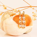 Delightfully Playful White Diamond Yellow Gold Earrings