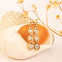 Delightfully Playful White Diamond Yellow Gold Earrings