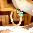 Diamond Shoulder Tsavorite and Tanzanite Yellow Gold Ring