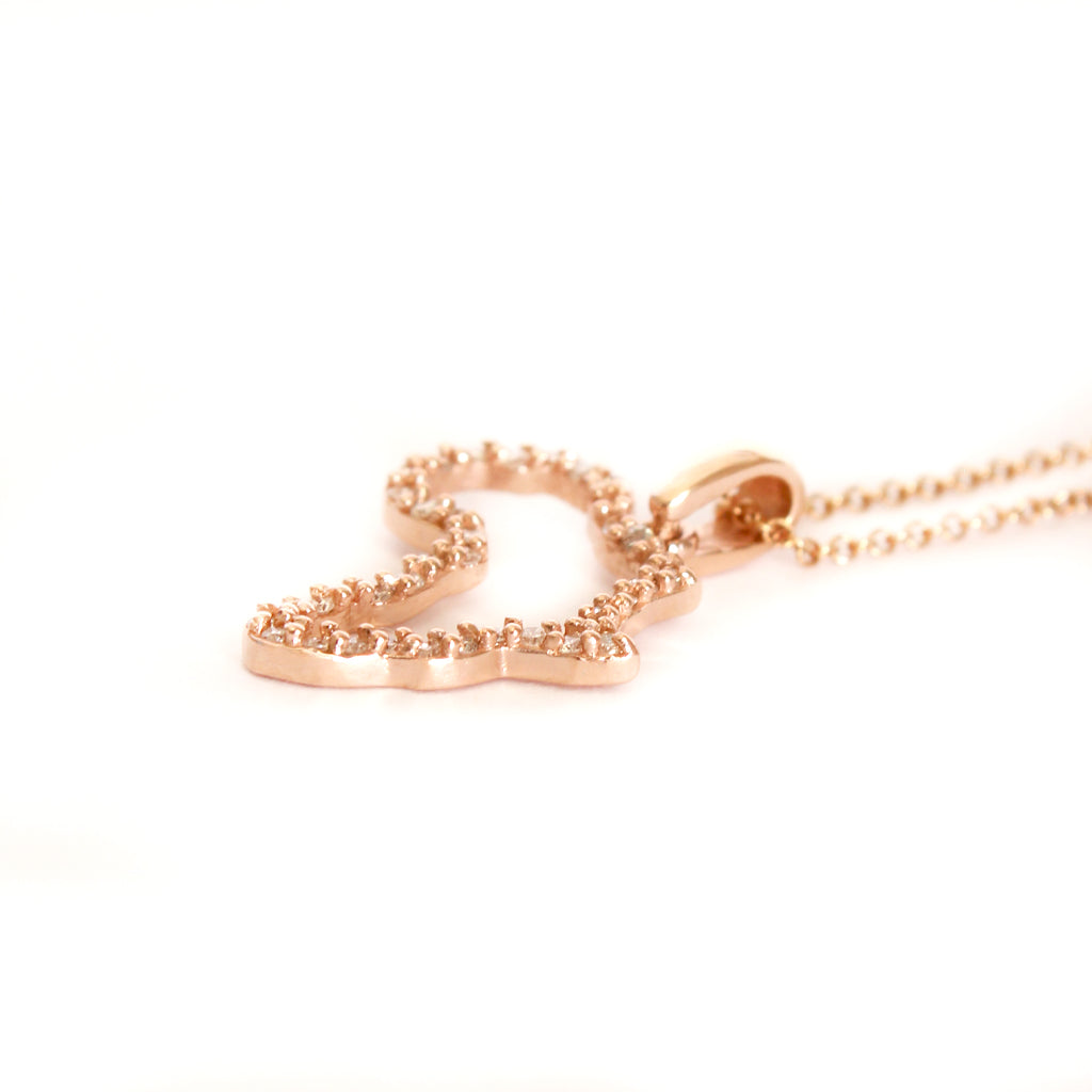 Diamond Studded Africa Rose Gold Pendant