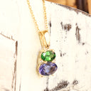 Double Oval Tsavorite and Tanzanite Pendant with Diamond Highlight in Yellow Gold